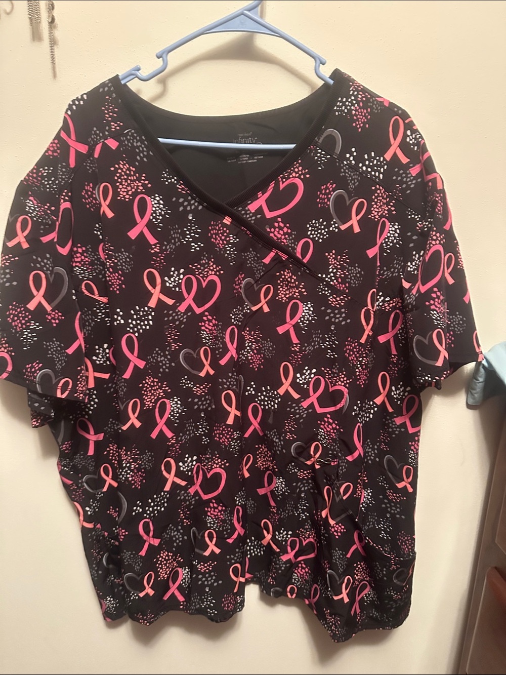 NFINITY Black Scrub Top with Pink Ribbon Print